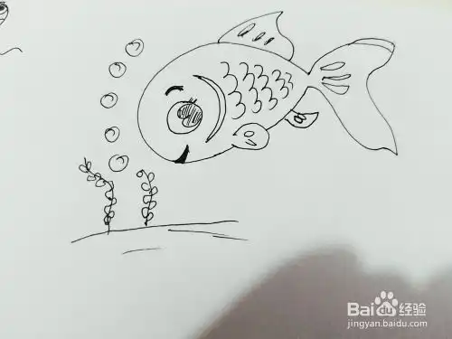 怎么画一只水里游的小鱼简笔画呢